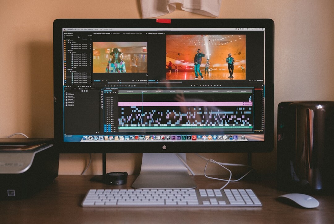 Video editor working on footage timeline on a monitor