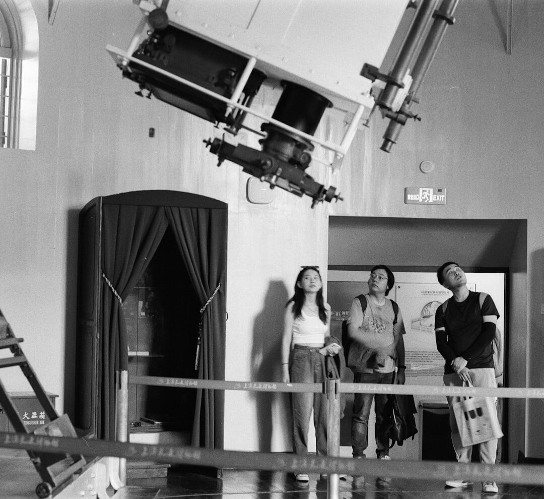 Presenter reading from an autocue in a television studio