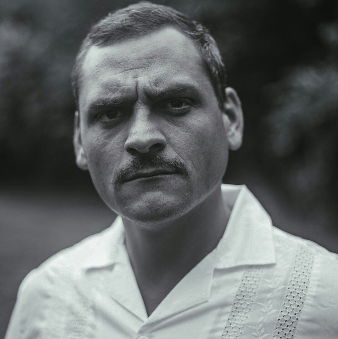 Studio portrait of a European man with short beard