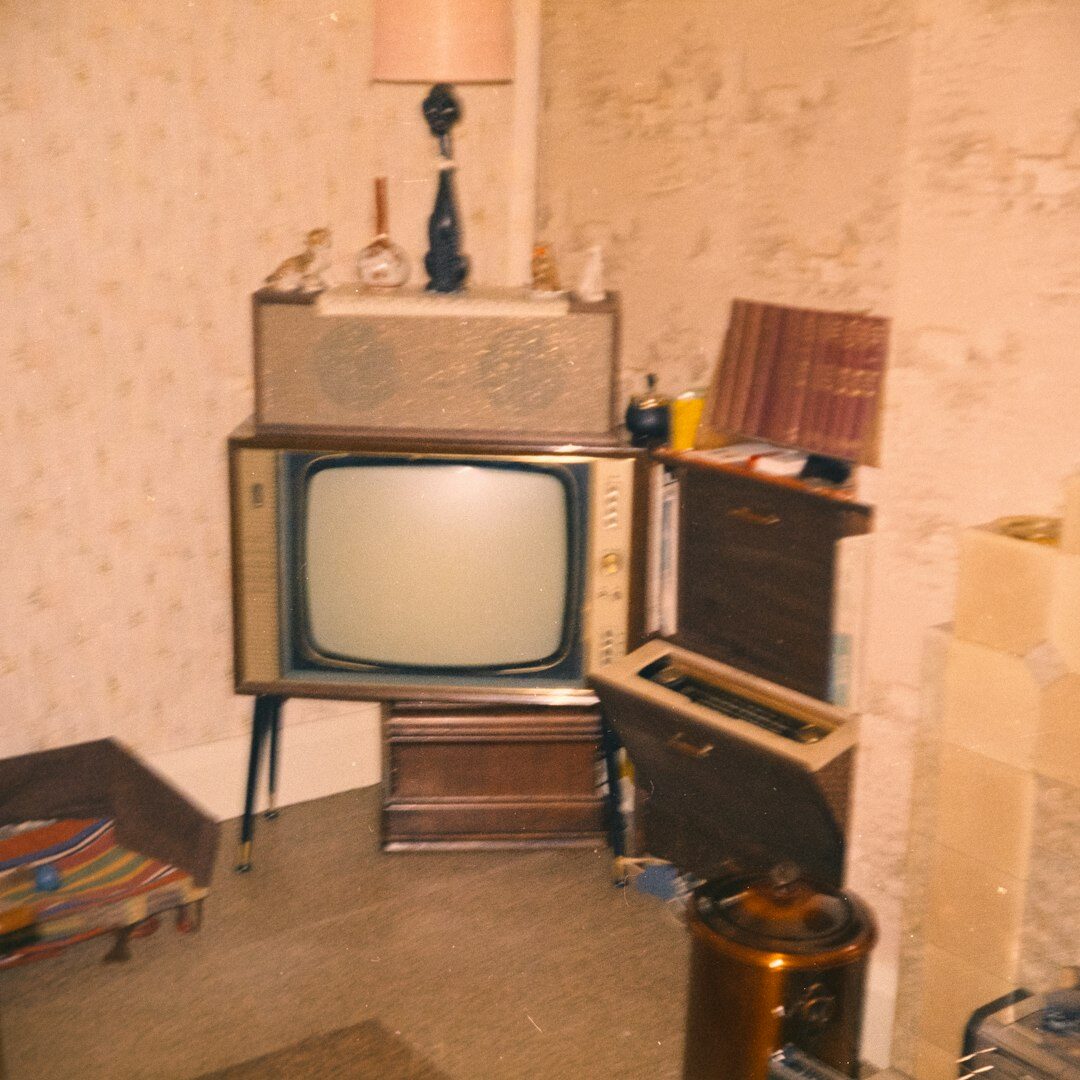 Close-up of a television anchor desk with microphones
